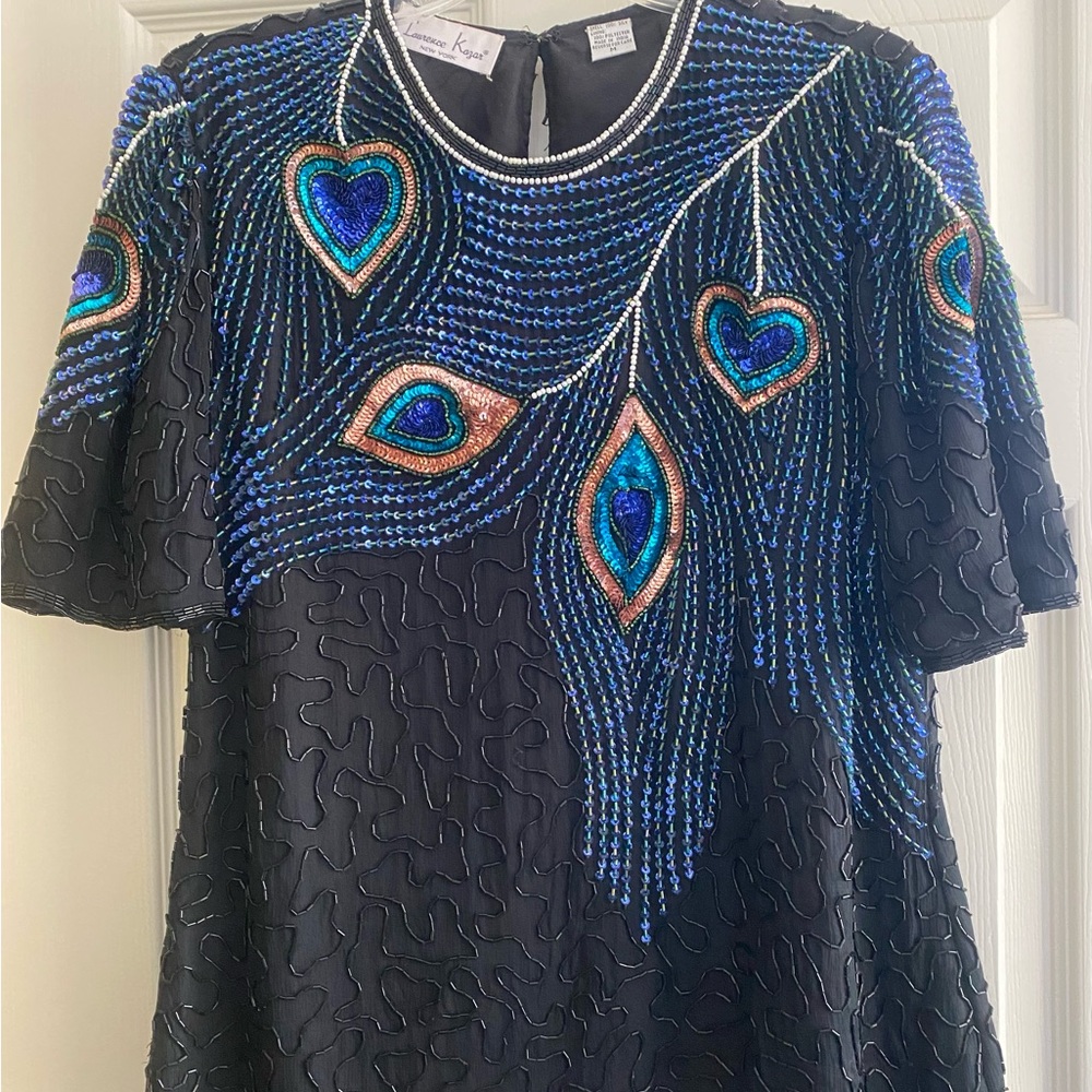 Ladies Peakcock Feather motif pull over blouse